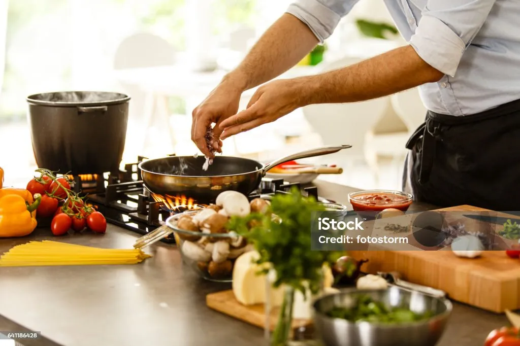 Fresh ingredients being prepared in a bright kitchen